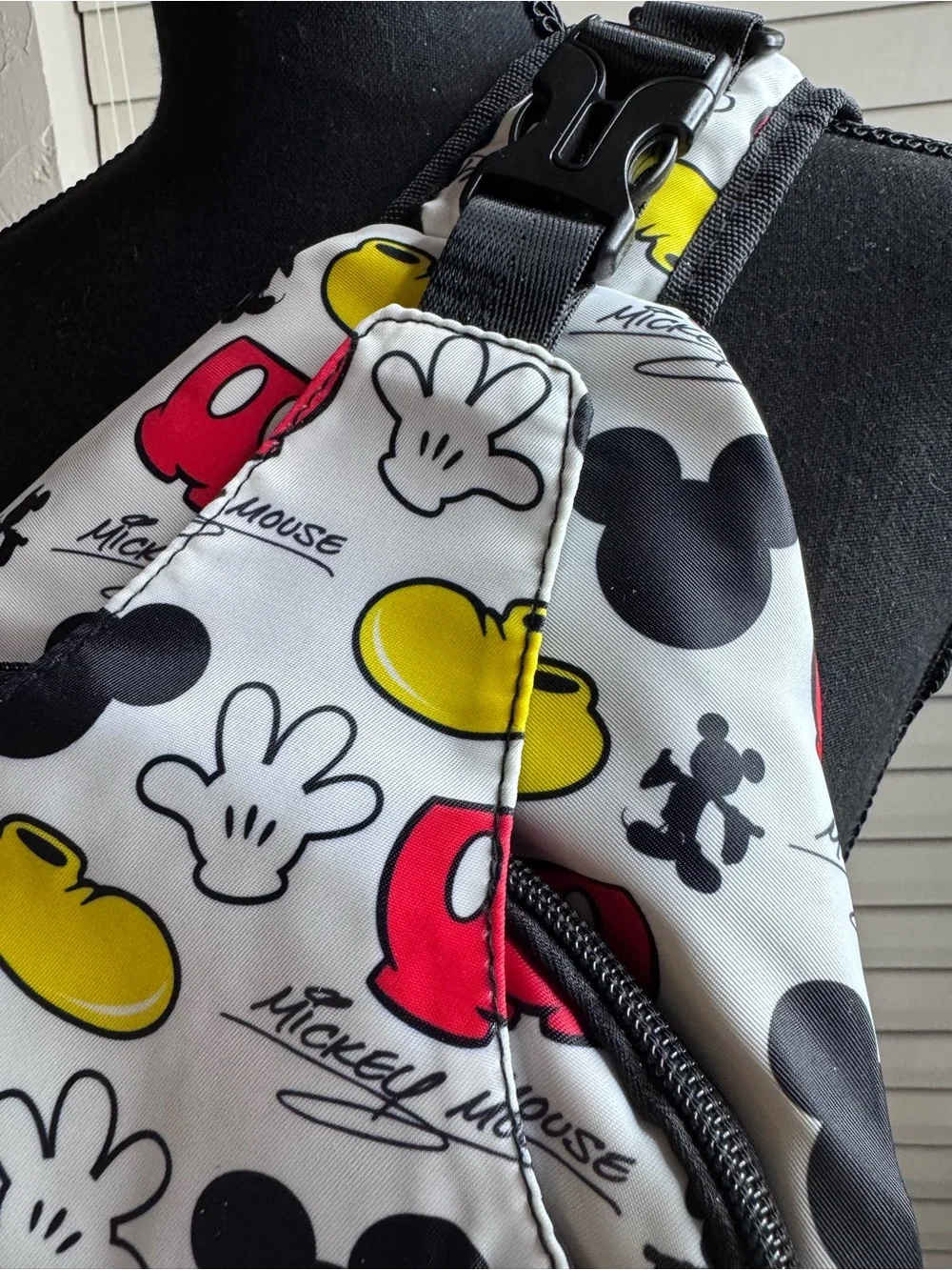 Disney White Sling Backpack with Red & Yellow Mickey Icons